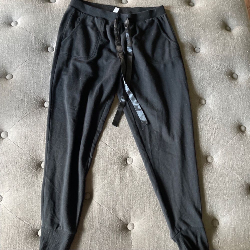 FloraβNikrooz largeβ blackβjoggers